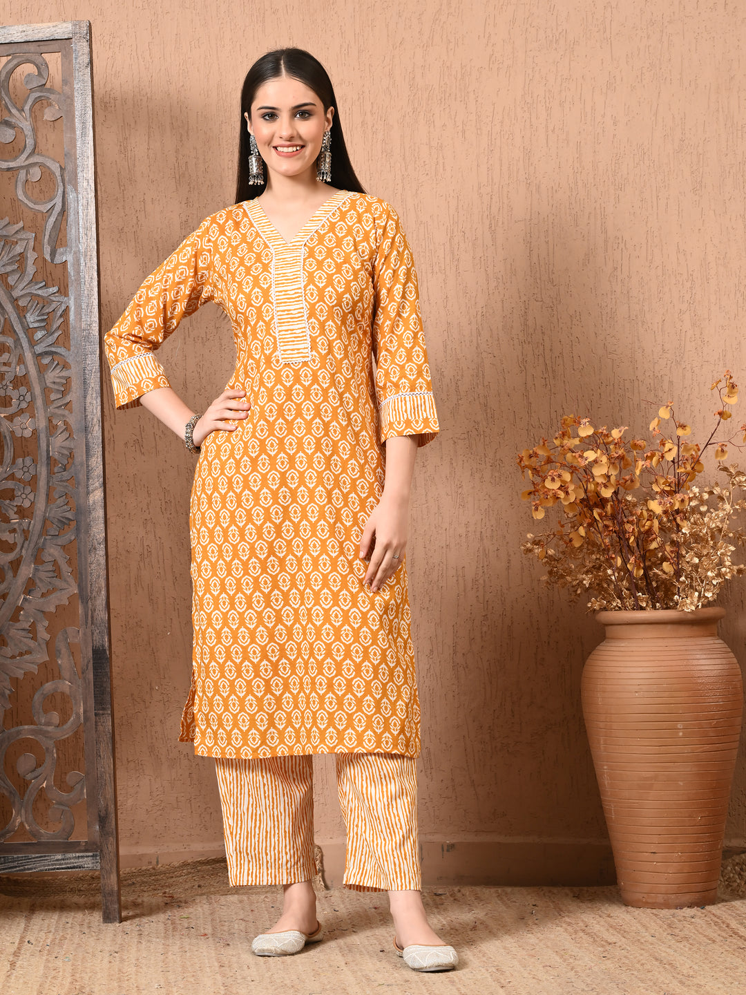 Yellow Floral V-Neck Kurta Sets