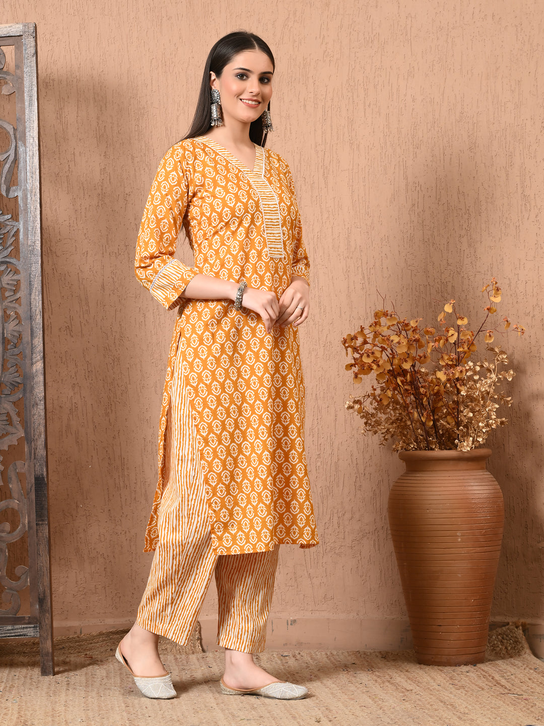 Yellow Floral V-Neck Kurta Sets